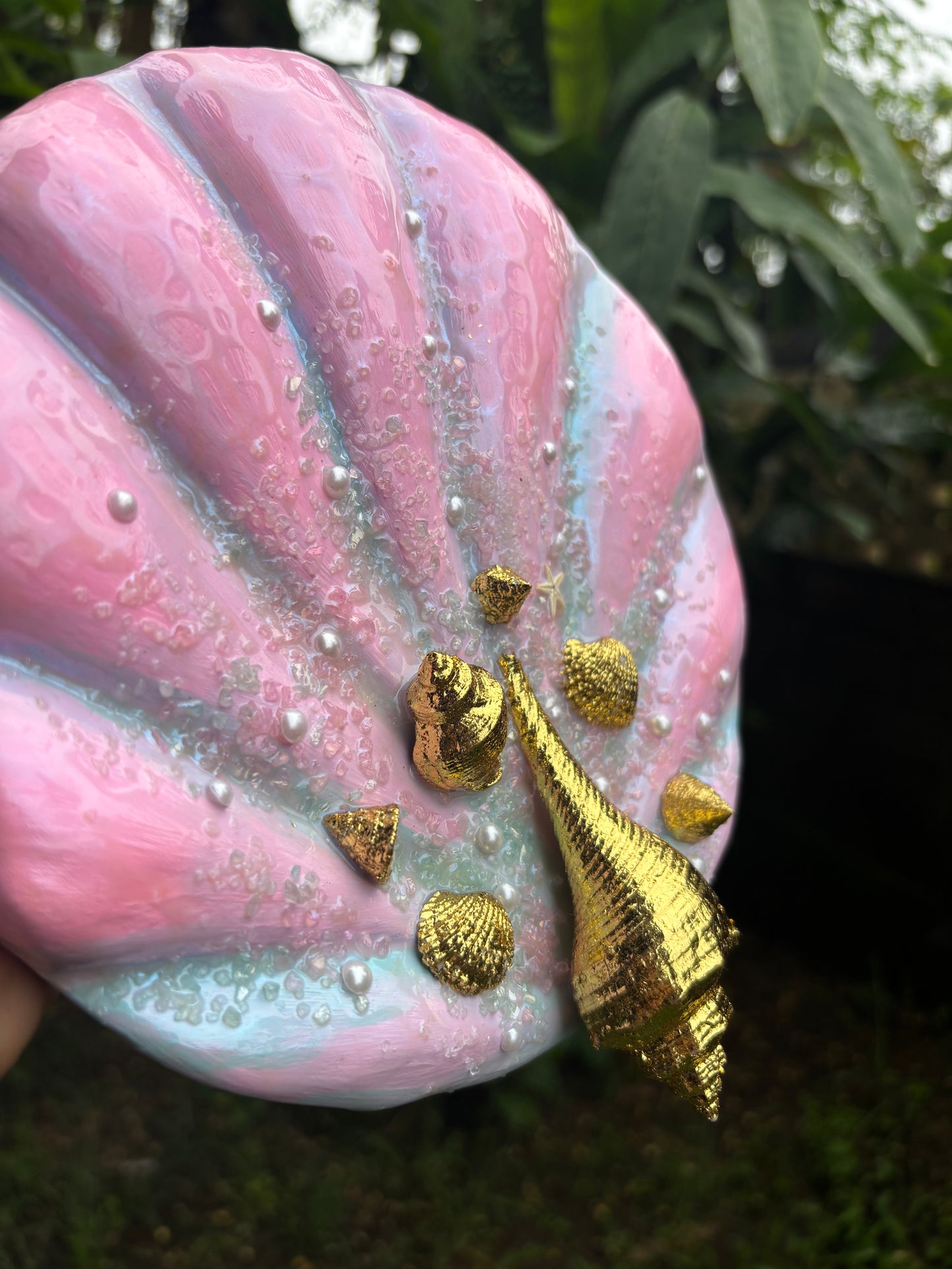 Mixed Media Art Piece with pink and gold embellishments on a natural background