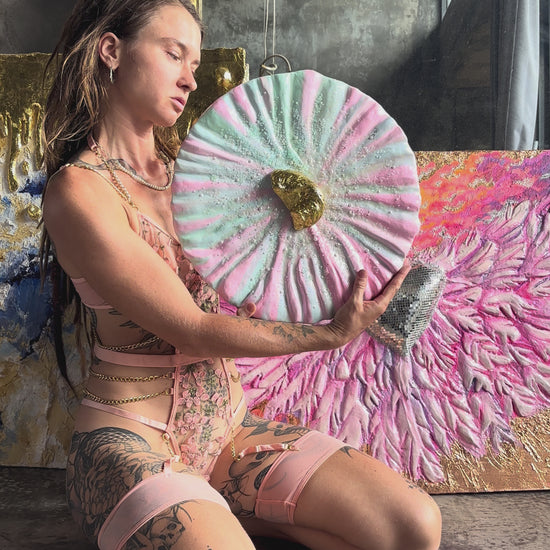 Woman holding Textured Art Painting "She oyster" with golden Oyster in the center